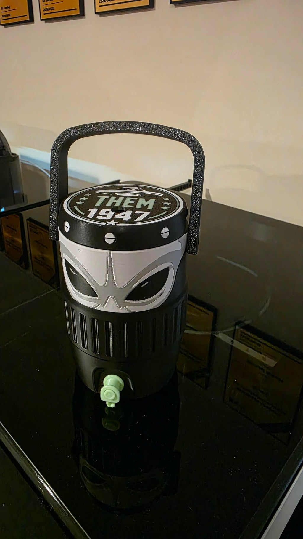 THEM 1947 Alien Coozie glowing under UV light with alien figure in background