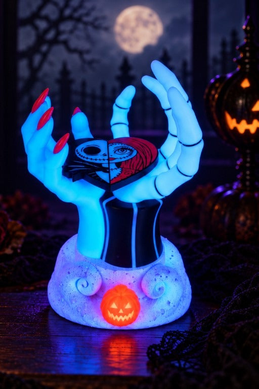 Glow-in-the-dark Jack and Sally candle holder