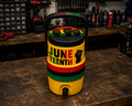 Juneteenth 3D printed coozie on a workshop bench