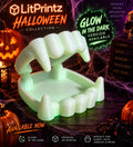 Glow-in-the-dark oversized vampire teeth tray with Halloween decor