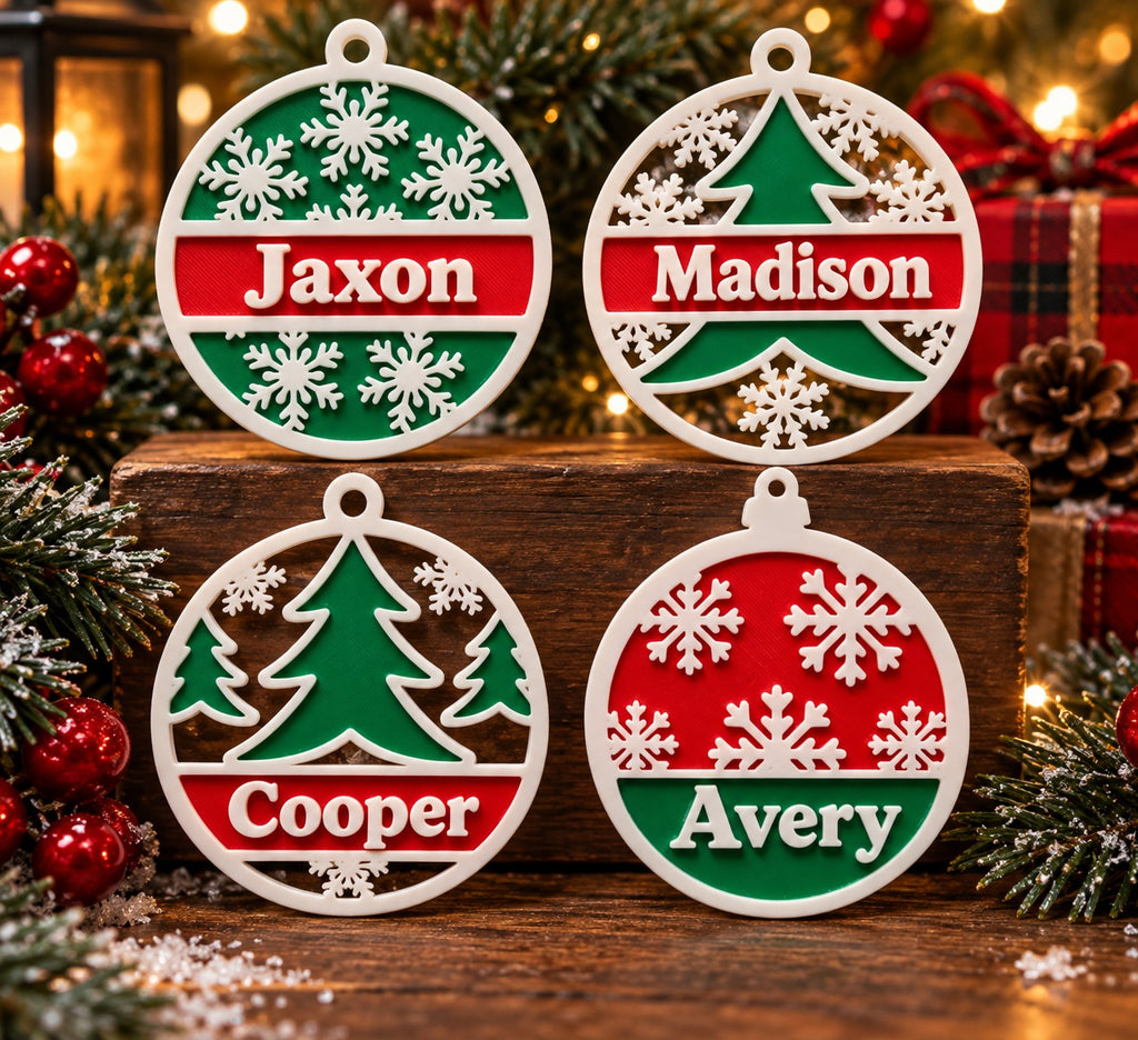 Four personalized red, green, and white Christmas ornaments with the names Jaxon, Madison, Cooper, and Avery